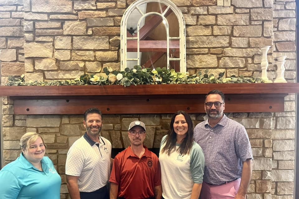 Kristen Goodchild, Ottawa Friendship House director of Finance; Tony Barrett, Friendship House executive director; Brandon Campbell, director of UAW Region 4; Allison Perez, Friendship House director of Employment and Outreach Services; and Nick Rutovic, UAW Region 4 servicing rep and Civil and Human Rights coordinator pose for a photo during the UAW Region 4 golf fundraiser at Seneca’s Oak Ridge Golf Course.