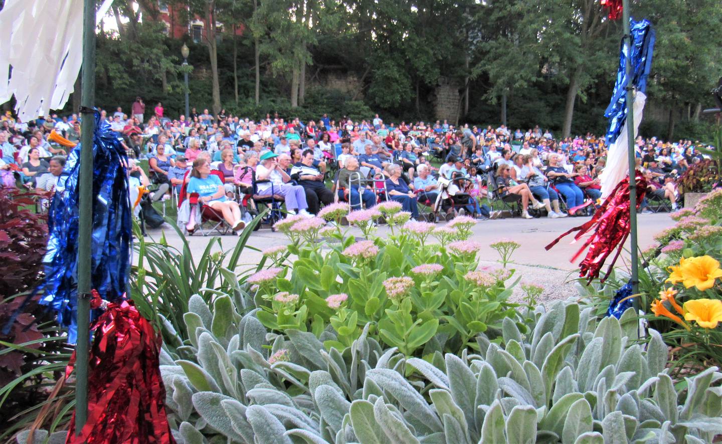 Crowds listen to a summer Concert on the Hill at Joliet's Billie Limacher Bicentennial Park. The summer concert series celebrates its 50th year in 2024.