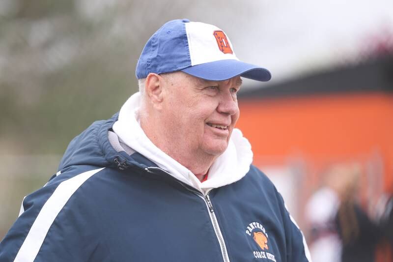 Oswego head coach Paul Netzel walks to the dugout before the game against Minooka on Wednesday, April 17, 2024 in Minooka.