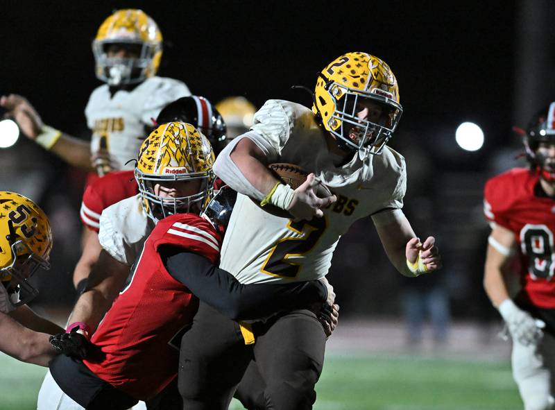 Jacob's Ryan Tucker runs the ball during the class 7A first round  playoff game against Lincoln-Way Central on Friday, Oct. 27, 2023, at New Lenox. (Dean Reid for Shaw Local News Network)