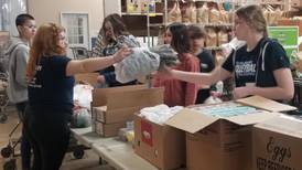 How 1 equals 8: Oswego schools, Servbank food pantry drive begins this week