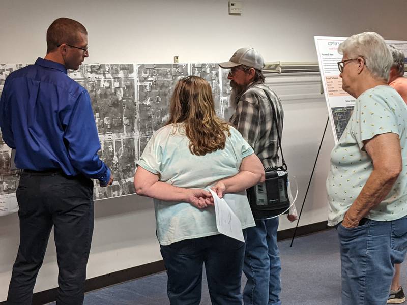 Troy Strange, of civil engineering company Hampton, Lenzini and Renwick, Inc., talks about the planned reconstruction of North Main Street in Sandwich during a June 26 open house.