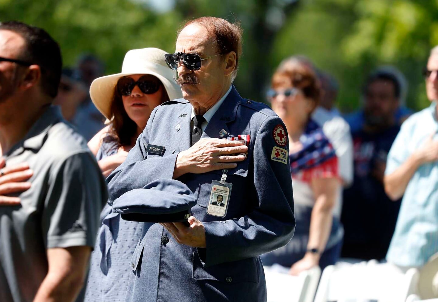 Red Cross first responder William Meskan covers his heart during the memorial for the 45th anniversary of the tragic crash of American Airlines Flight 191 Saturday in Des Plaines. Meskan was one of the Red Cross members who responded to the scene of the crash.