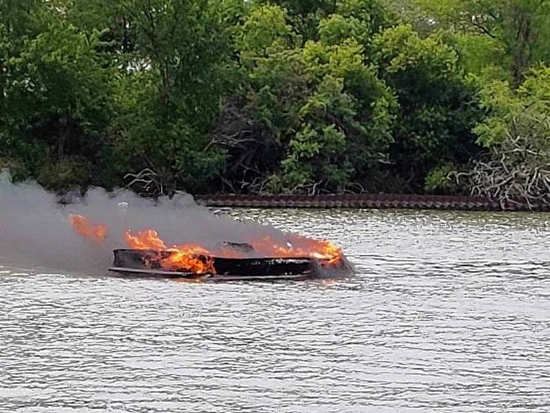 A small boat was fully involved in flames on Pistakee Lake the afternoon of Sunday, Aug. 6, 2023.