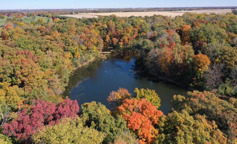 Trees are beginning to reach their peak across Matthiessen Lake at Matthiessen State Park on Wednesday, Oct. 19, 2022 in Oglesby.