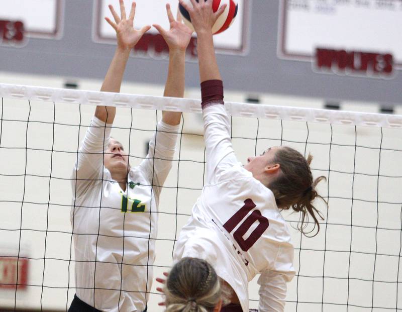 Prairie Ridge’s Addison Smith, right, and Crystal Lake South’s Joanna Kruolek battle at the net in varsity girls volleyball on Thursday, Aug. 29, 2024, at Prairie Ridge High School in Crystal Lake.