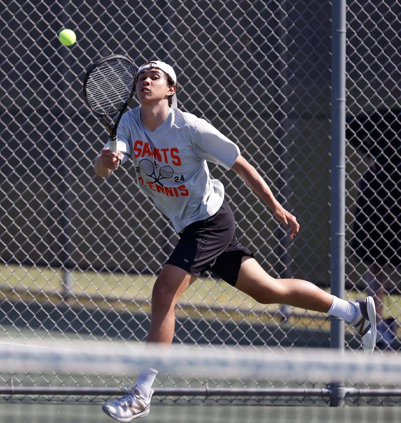 St. Charles East’s Tiernan Price plays during the St. Charles North boys tennis sectional Saturday, May 18, 2024 in St. Charles.