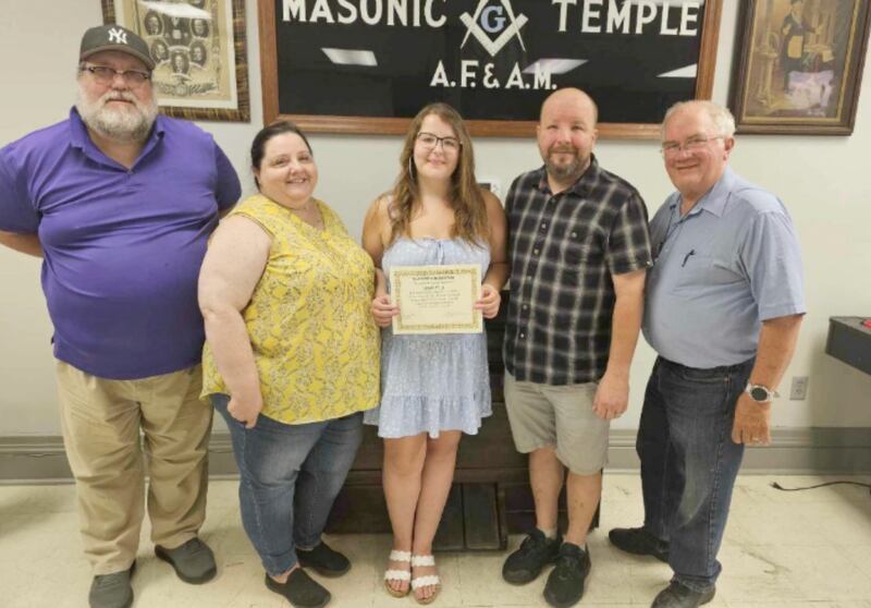 Scholarship winner Ellissa Pelka (center) stands with her parents Michelle (left) and Phil Sterba (right). Representing St. John’s Lodge No. 13 are Junior Deacon Jeff Glade (far left) and Secretary Larry Lawson (far right). Vocational scholarship winner Jessina Javier Avarca was unable to attend the dinner.