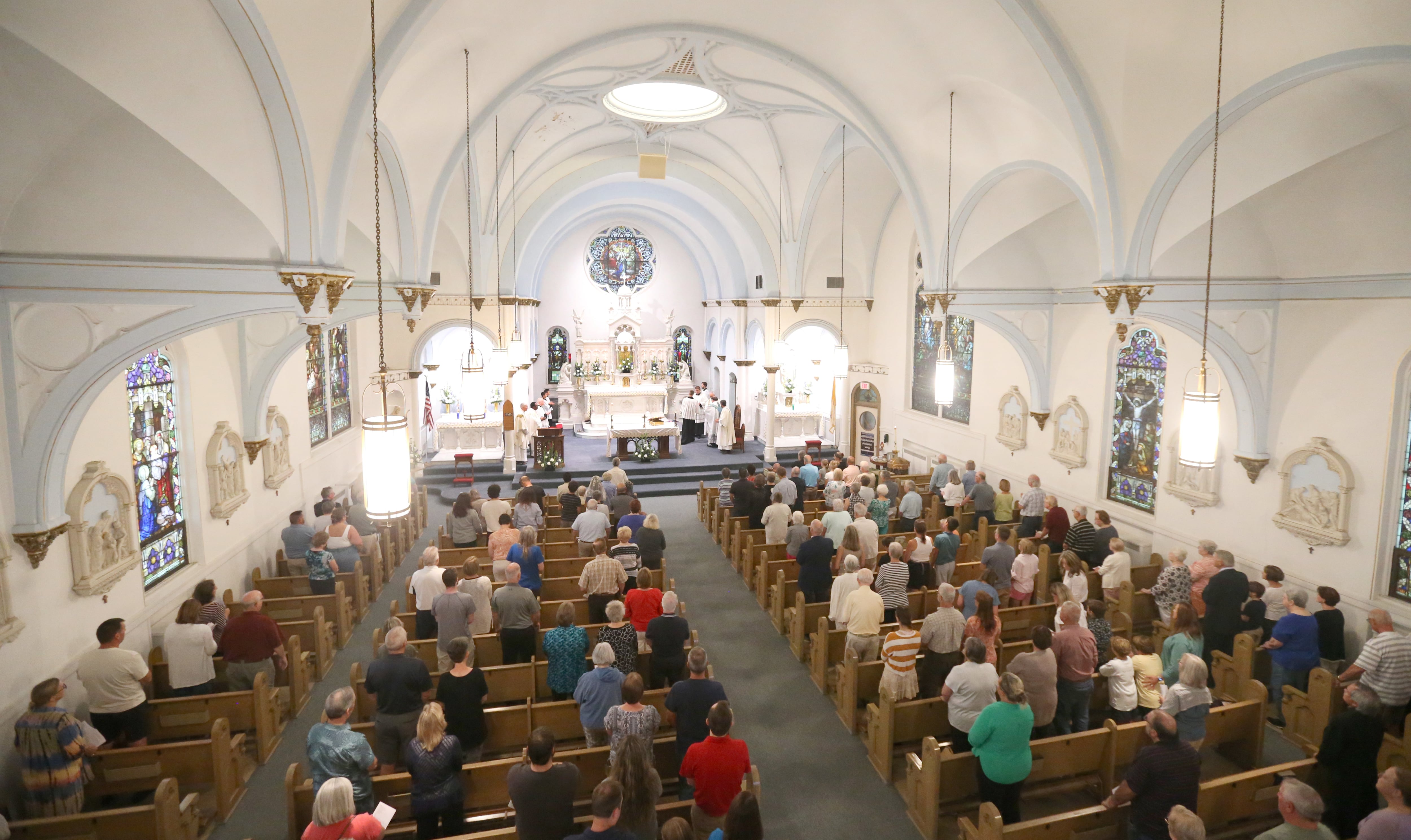 Hundreds of parishioners stand during the final Mass on Thursday, Aug. 15, 2024 in Peru. The church was founded in 1867.