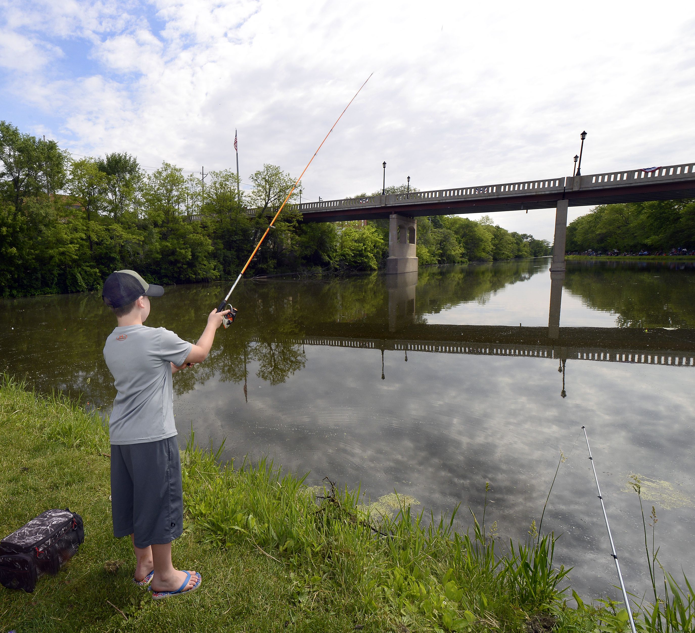 Landon Gleason finds a picturesque spot to try his luck during the 2022 Kids Fishing Tournament at Lock 14 in La Salle.