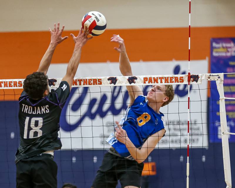 Lyons Sam Levinson (8) spikes the ball for the win during Oswego Sectional final between Downers Grove North at Lyons.  May 30, 2023.