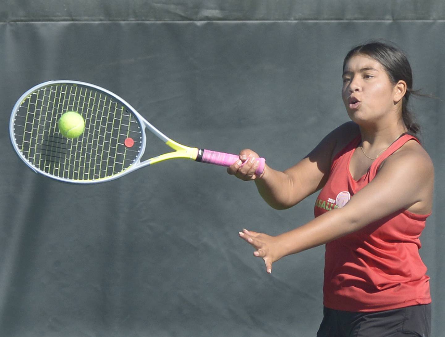 LaSalle Peru senior Eva Cervantes hits a shot during the singles third-place match of Saturday's Class 1A Ottawa Sectional at the Henderson-Guenther Tennis Facility.