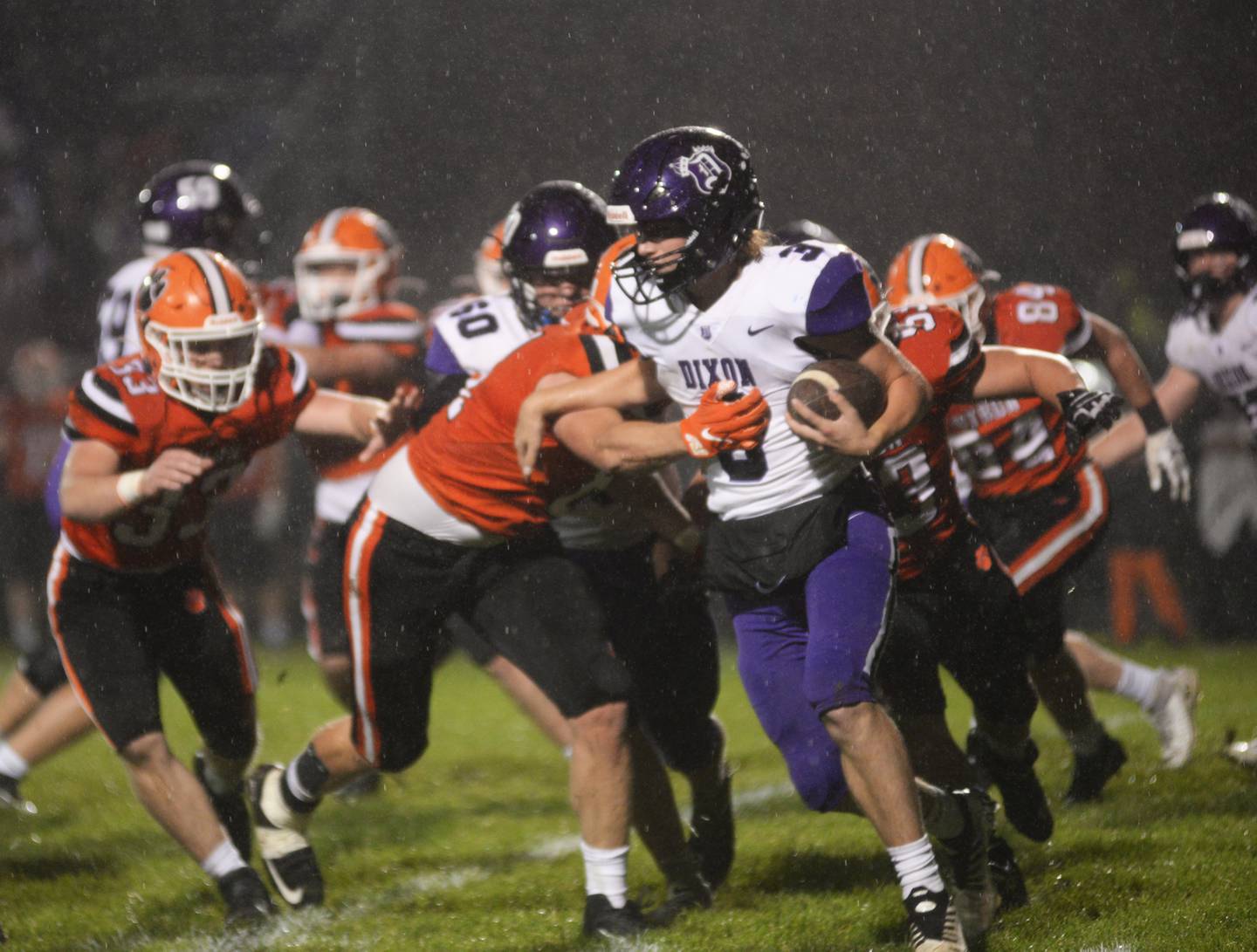 Dixon's Tyler Shaner (3) looks for running room against Byron on Friday, Oct. 13, 2023 at Byron High School's Everett Stine Field.