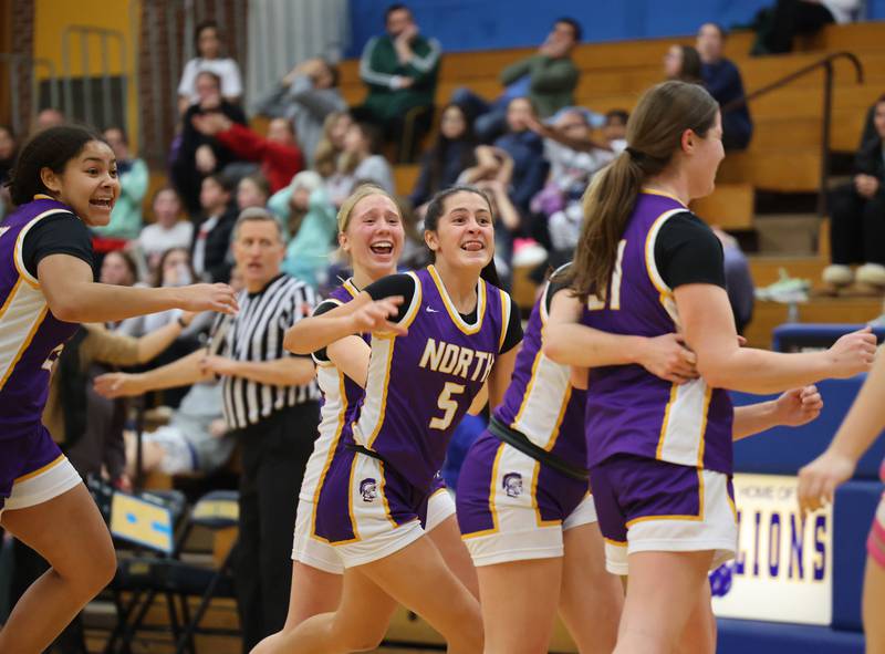 Downers Grove North reacts to the game winning shot by Ann Stephens against Lyons Township during the girls varsity basketball game on Tuesday, Jan. 16, 2024 in La Grange, IL.