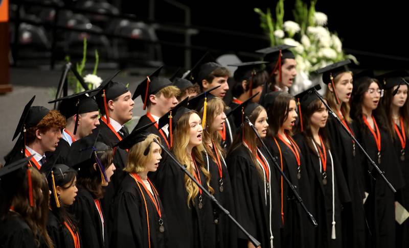 Senior members of the St. Charles East choir perform during the school’s 2024 commencement ceremony at Northern Illinois University in DeKalb on Monday, May 20, 2024.