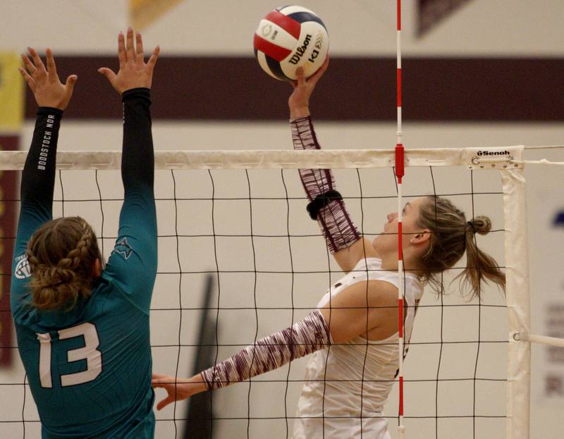 Richmond-Burton’s Elissa Furlan sends the ball over the net against Woodstock North  in varsity volleyball on Monday, Sept. 16, 2024, at Richmond-Burton High School in Richmond.