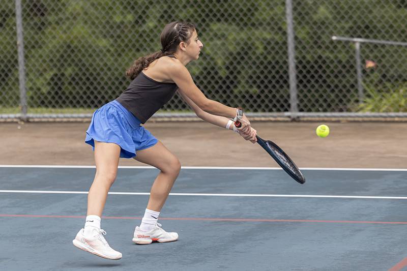 Meerna Elbzour plays the ball Wednesday, July 27, 2023 while playing mixed doubles in the Emma Hubbs Tennis Classic in Dixon.