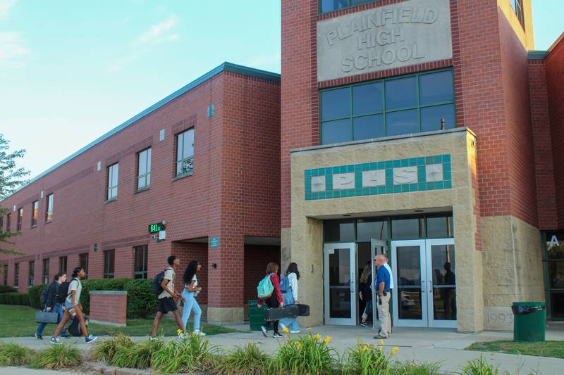 Plainfield High School-Central Campus students stream into the building on the first day of school on Thursday, August 18, 2022.