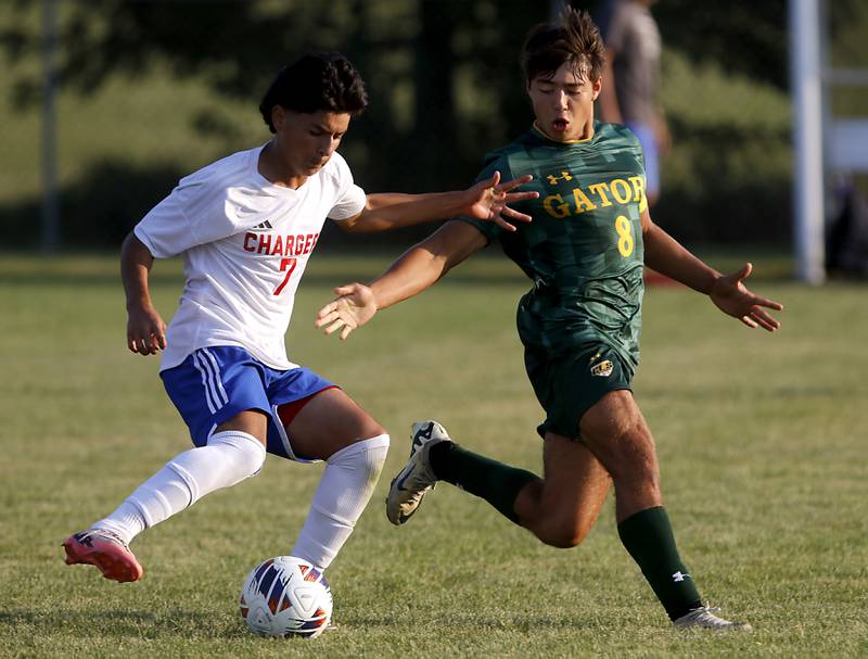 Dundee-Crown's Hugo Arista controls the ball in front of Crystal Lake South's Hayden Stone during a Fox Valley Conference soccer match on Tuesday, Sept. 10, 2024, at Crystal Lake South High School.