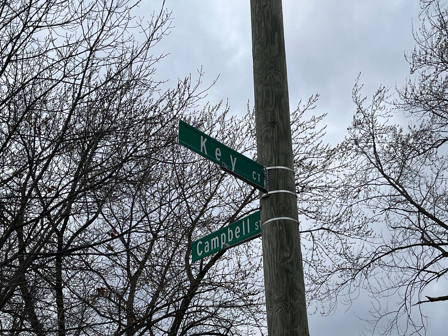 Signs for the intersection of Campbell Street and Key Court in Joliet. A 27-year-old man was wounded in a shooting on Tuesday in the area.