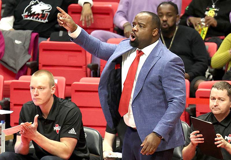 Northern Illinois Huskies head coach Rashon Burnoyells instructions to his team during their game against Albany Tuesday, Dec. 20, 2022, in the Convocation Center at NIU in DeKalb.