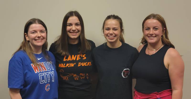 Streator High School seniors (from left) Kirsten Peterson, Kora Lane, Rilee Talty and Charli McMullen were part of a group of students that stayed after the Bulldogs' game with Ottawa at King Field on Sept 1 to clean up the student's section. Not pictured were Ophelia Orozco and Jade Willaims.