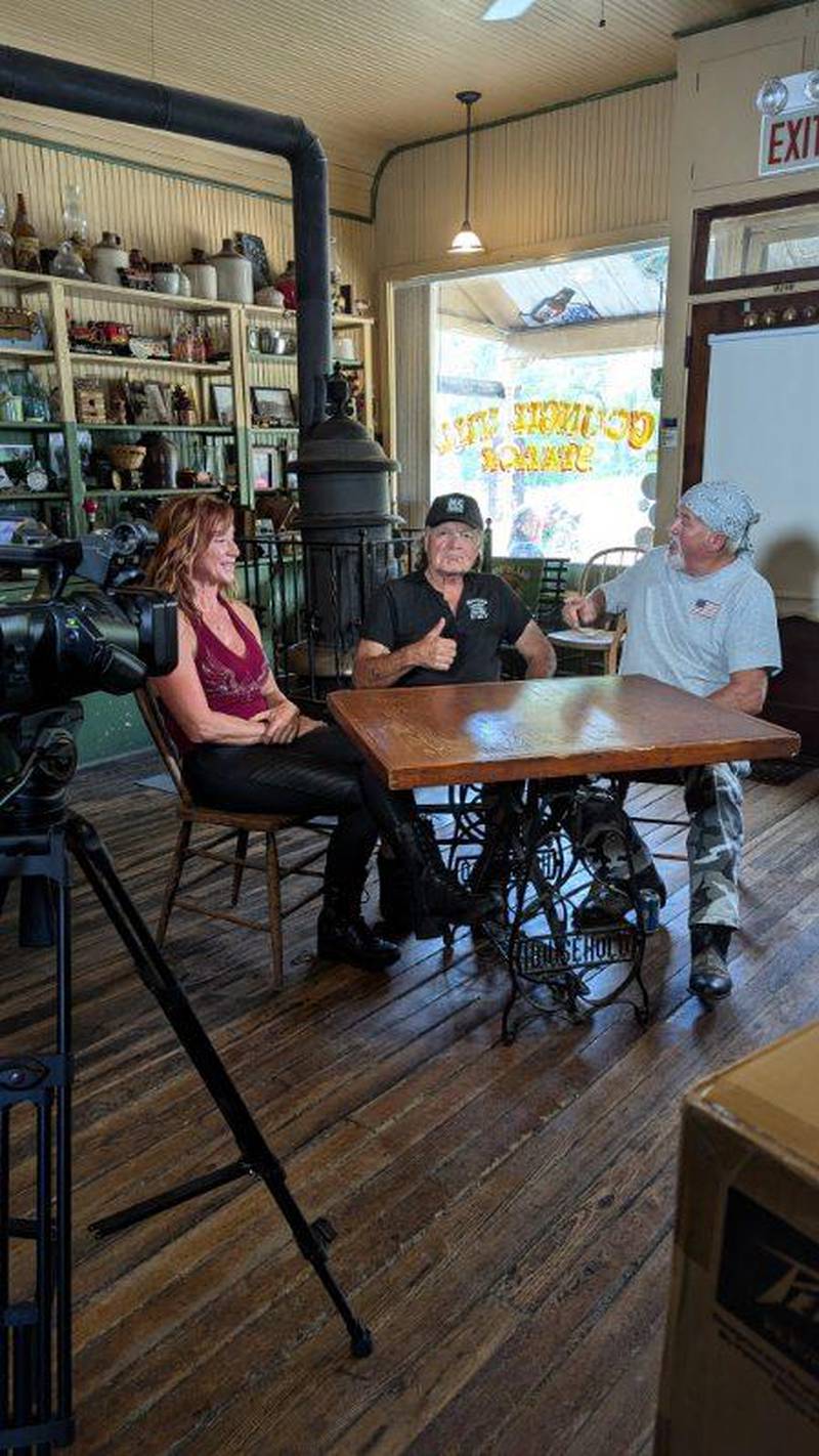 Bob Farster (right), Jamie Jones (center) and Sondra Huntoon talk at the Council Hill Station in Scales Mound. Huntoon was sitting in for co-host Chuck Parker.