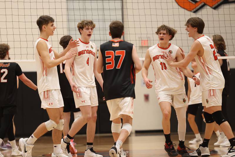 Plainfield East celebrates a two set win over Lincoln-Way West on Wednesday, March 22nd. 2023 in New Lenox.