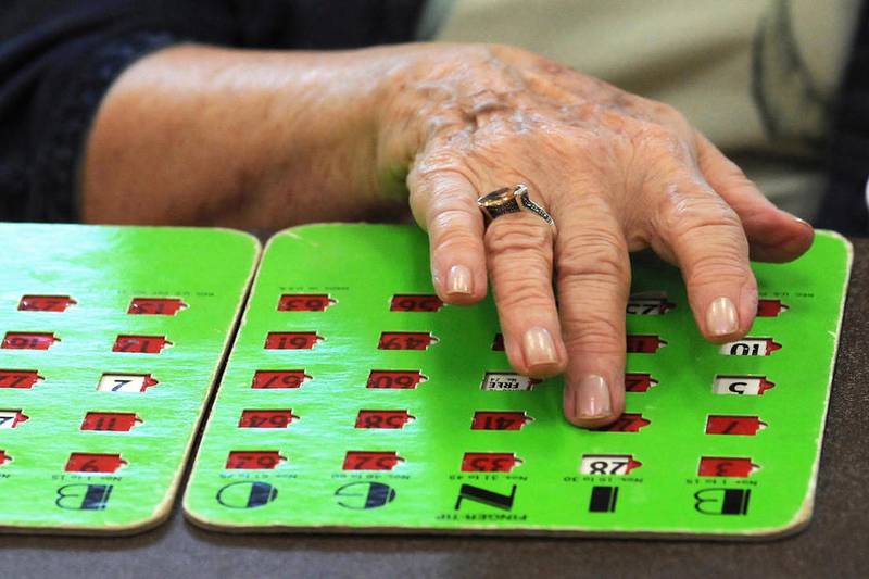 Glen Ellyn resident Lois Burke keeps track of her cards during afternoon bingo, one of the Senior Appreciation Week events, at the Main Street Recreation Center on Monday, August 8.  
Steve Bittinger for Shaw Media