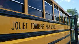 SUV hits Joliet high school bus with students on board, minor injuries reported
