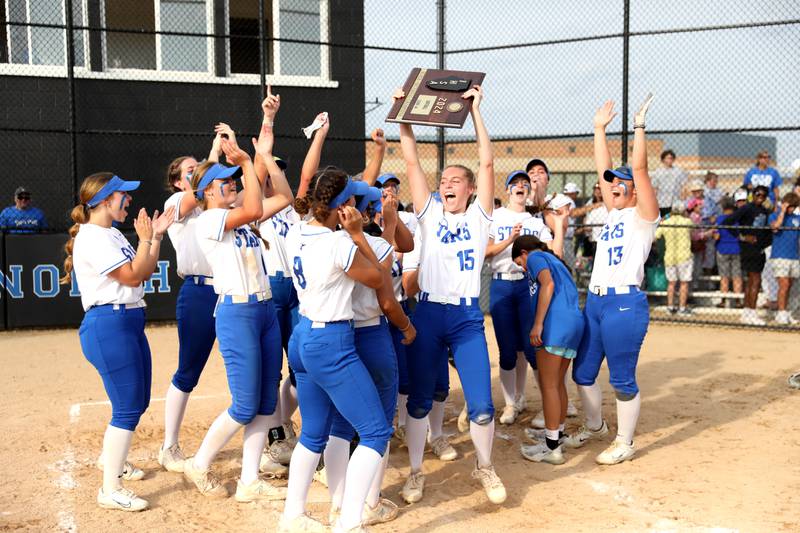 St. Charles North players celebrate their Class 4A St. Charles North Supersectional win over Whitney Young on Monday, June 3, 2024.