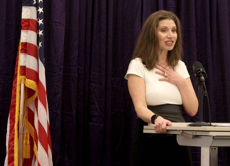 Jayme Muenz, candidate for St. Charles’ 2nd ward alderman, gives her opening statement during a candidate forum hosted by the St. Charles Chamber of Commerce at Clarke Control in St. Charles on Wednesday, Feb. 22, 2023.