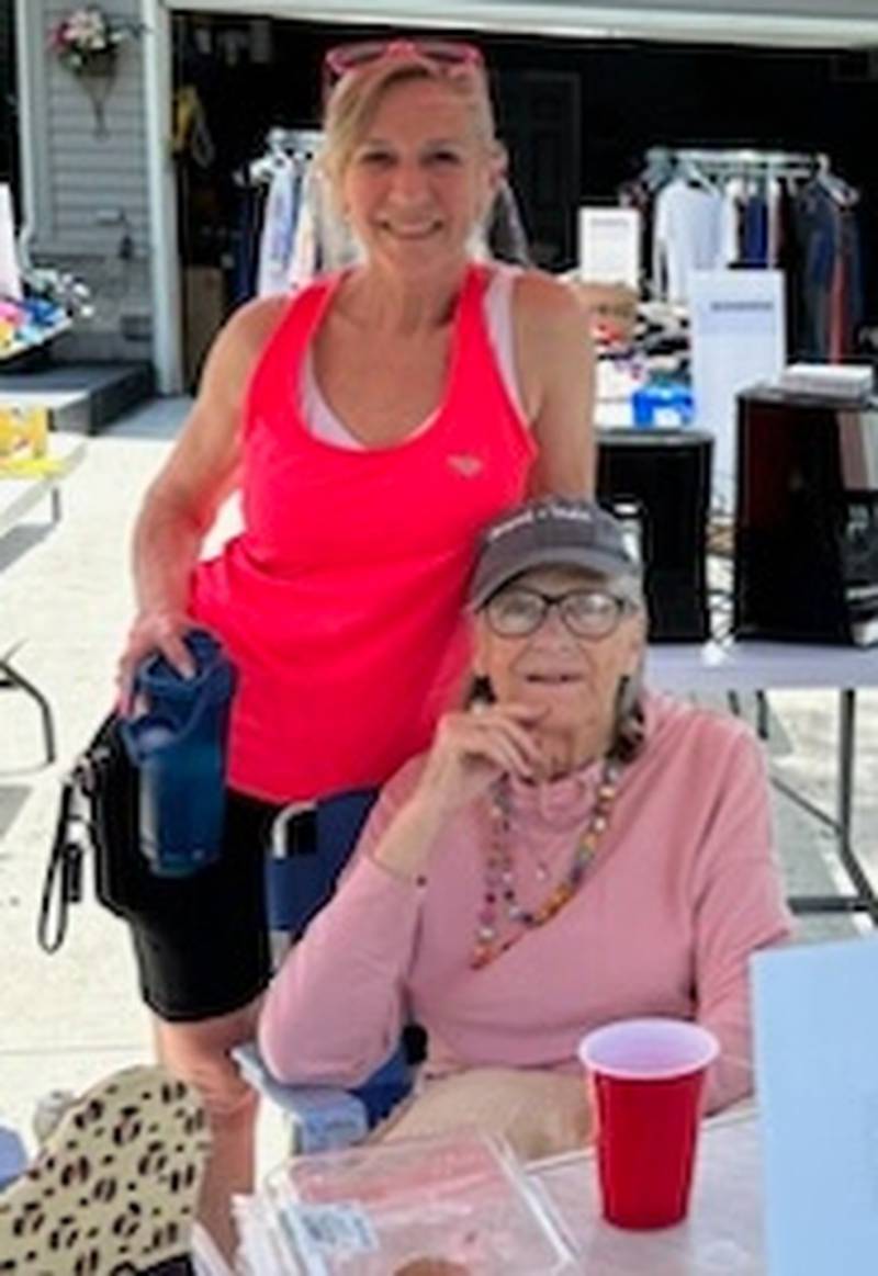 (Left to right); Lawerence garage sale volunteer Bonnie Wood and event organizer Marcy Lawerence