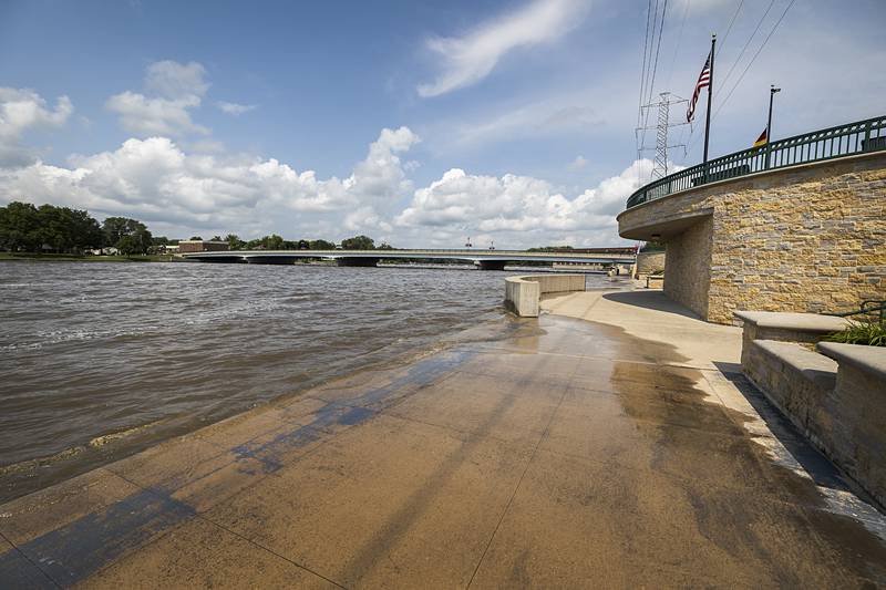 Water laps up into Heritage Plaza Monday, July 15, 2024 in Dixon. Water levels continue to raise all through the Rock River Valley.