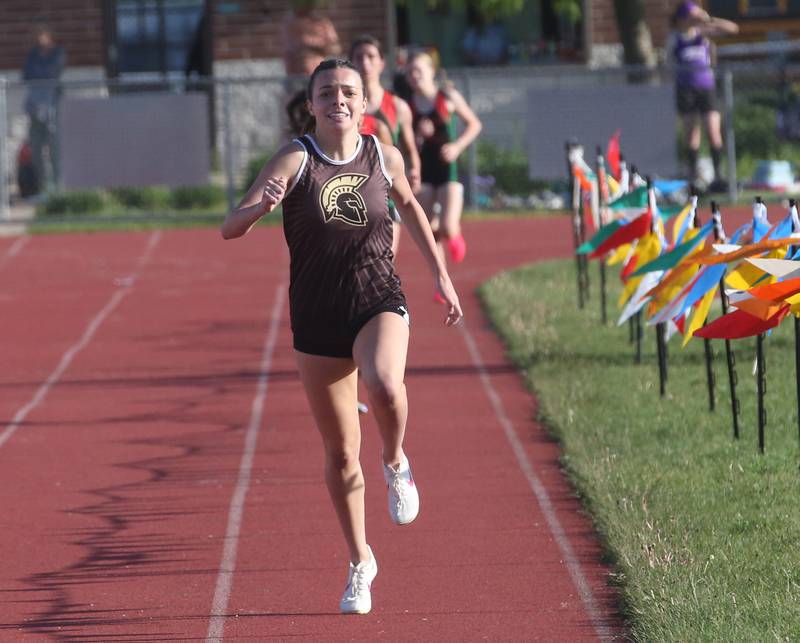 Sycamore's Layla Janisch competes in the 800 meter run during the Interstate 8 conference track meet on Friday, May 3, 2024 at the L-P Athletic Complex in La Salle.