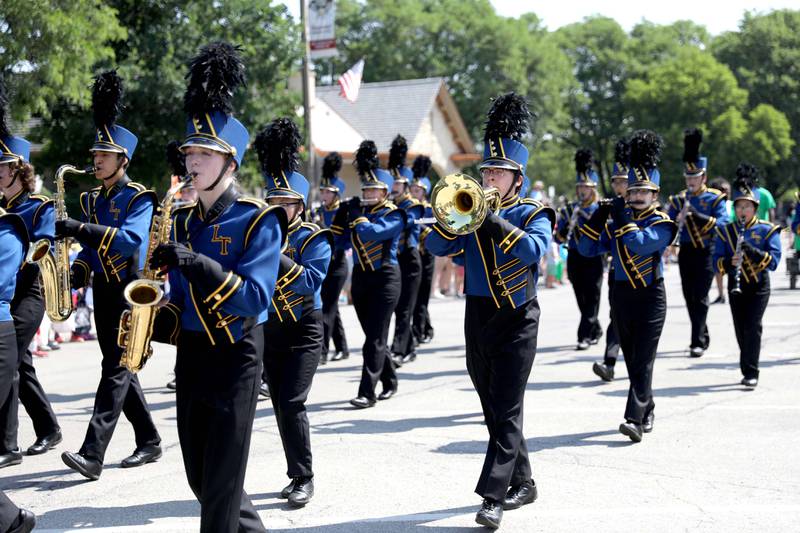 Members of the Lyons Township High School Marching Band perform during the 77th Annual La Grange Pet Parade on Saturday, June 3, 2023.