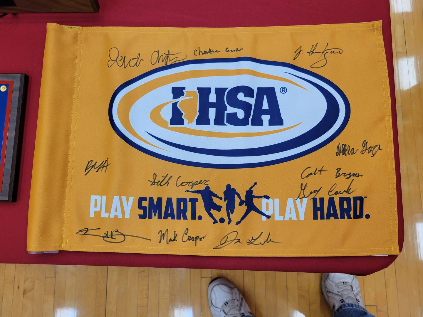 A flag signed by members and coaches of the Ottawa boys golf team that won the IHSA Class 2A championship at Illinois State University’s Weibring Golf Club.