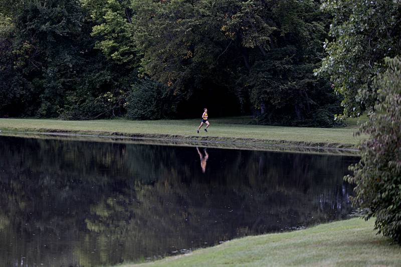 Sterling’s Dale Johnson runs alone Tuesday, Sept. 12, 2023 during the Twin Cities Cross Country Meet at Centennial Park in Rock Falls. Johnson took the boys race with a 15:08 run.