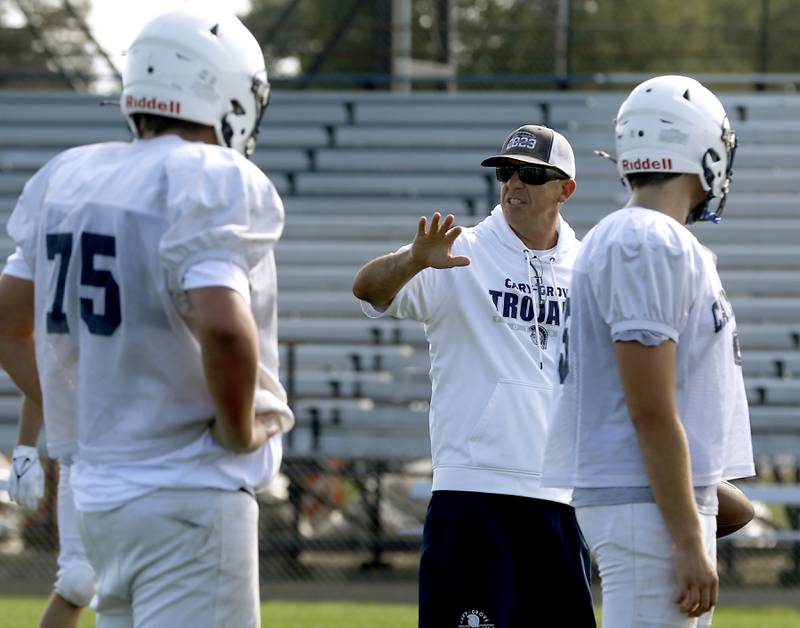 Cary-Grove head coach Brad Seaburg
Talks to his players during football practice Tuesday, Aug. 20, 2024, at Cary-Grove High School, as the 2023 IHSA Class 6A champions look to defend their title.