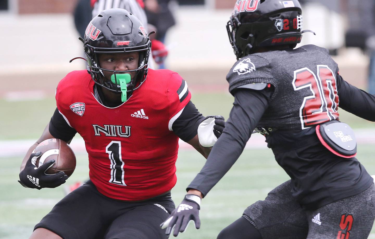 Northern Illinois running back Antario Brown tries to get by cornerback Jacob Finley during the Spring Showcase Saturday, April 22, 2023, at Huskie Stadium at NIU in DeKalb.