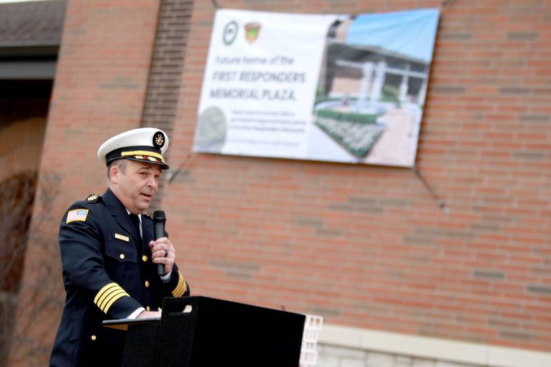 Elmhurst Fire Department Deputy Chief Steve Reynolds addresses attendees during a groundbreaking for a first responders memorial plaza at the Elmhurst Fire Department Station 2.