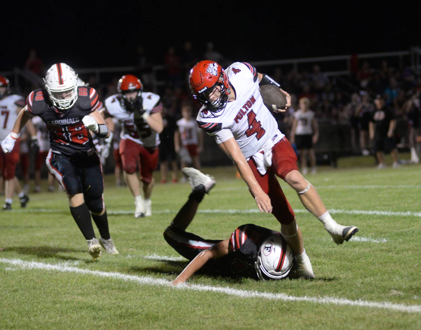 Fulton's Dom Kramer (4) runs for a gain against Forreston on Friday, Aug. 24, 2023.