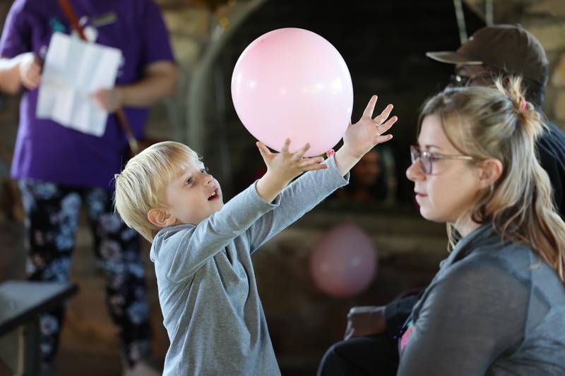 Noah Schleicher, 4, from DeKalb, plays with a balloon Friday, Sept 15, 2023, at the Sycamore Community Sports Complex during a celebration of the life of Gracie Sasso-Cleveland on what would have been her sweet 16 birthday. Sasso-Cleveland, 15, was found dead May 7, 2023, in DeKalb. Timothy M. Doll, 29, of DeKalb, is charged with first-degree murder in her death.