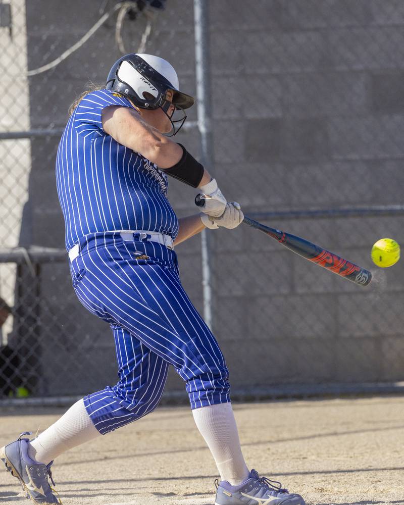 Newark's Kate Bromeland singles to drive in two runs against Grant Park during the Class 1A Sectional Semifinal game at Woodland High School on May 22, 2024.