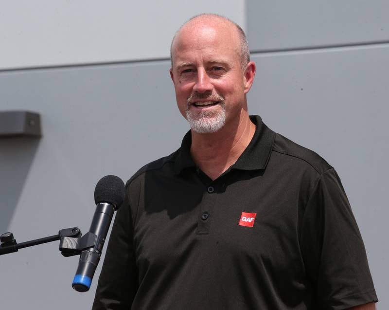 GAF COO Randy Bargfrede speaks during a grand opening celebration at the GAF facility on Tuesday, July 16, 2024 in Peru.