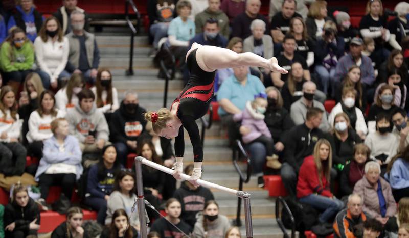 Hinsdale Central's Kelly Klobach competes on the uneven parallel bars during the IHSA Girls Gymnastics State Final meet Friday February 18, 2022 at Palatine High School.