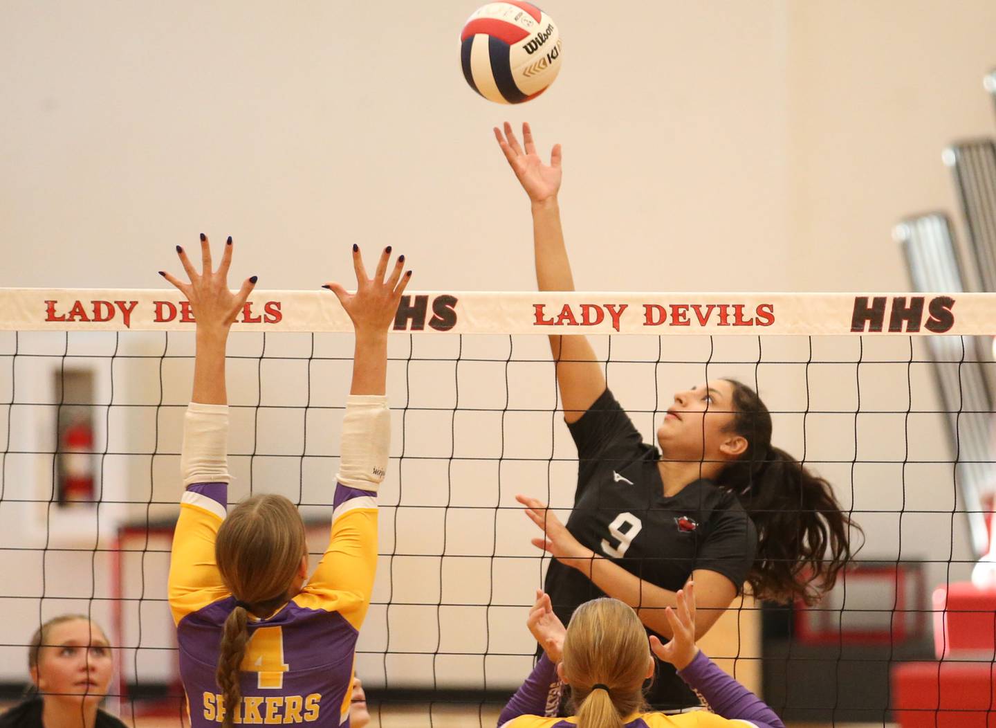 Hall's Natalia Zamora gets the ball past Mendota's Laylie Denault and teammate Elaina Reddin on Tuesday, Sept. 13, 2024 at Hall High School.