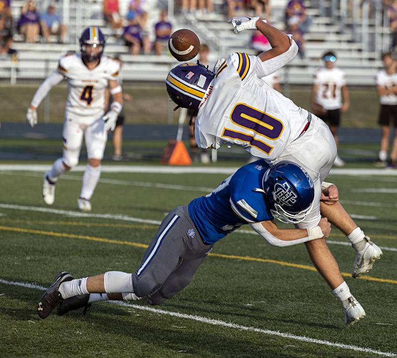 Newman’s Carter Rude breaks up a pass intended for  Sherrard’s Noah Fender Saturday, Sept. 2, 2023 in a game at Sterling High School.