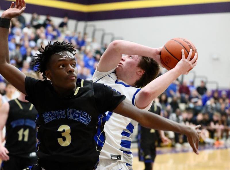 Princeton junior Jordan Reinhardt takes a shot against Rockford Christian in Noah LaPorte throws down a dunk in Tuesday's regional semifinal at Mendota. The Tigers won 69-66.