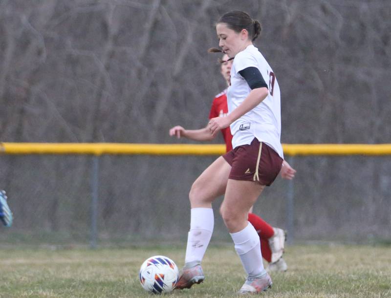 Morris's Nicolette Boelman kicks the ball into Streator territory on Monday, March 25, 2024 at the James Street Recreation Area in Streator.